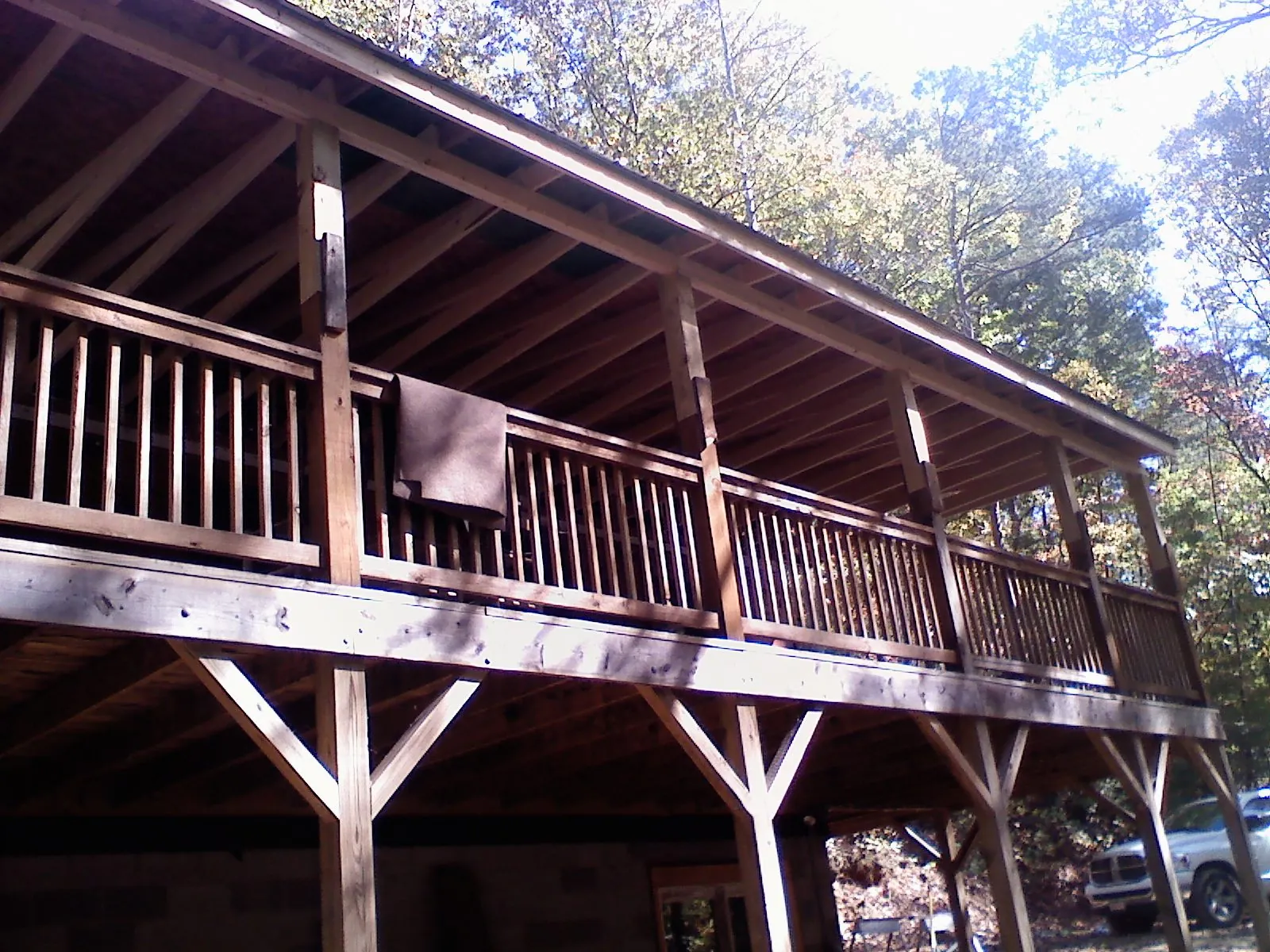 Timber framing under a new elevated porch and deck — Roof Leak Repair in Sand Creek by Roofing Brothers